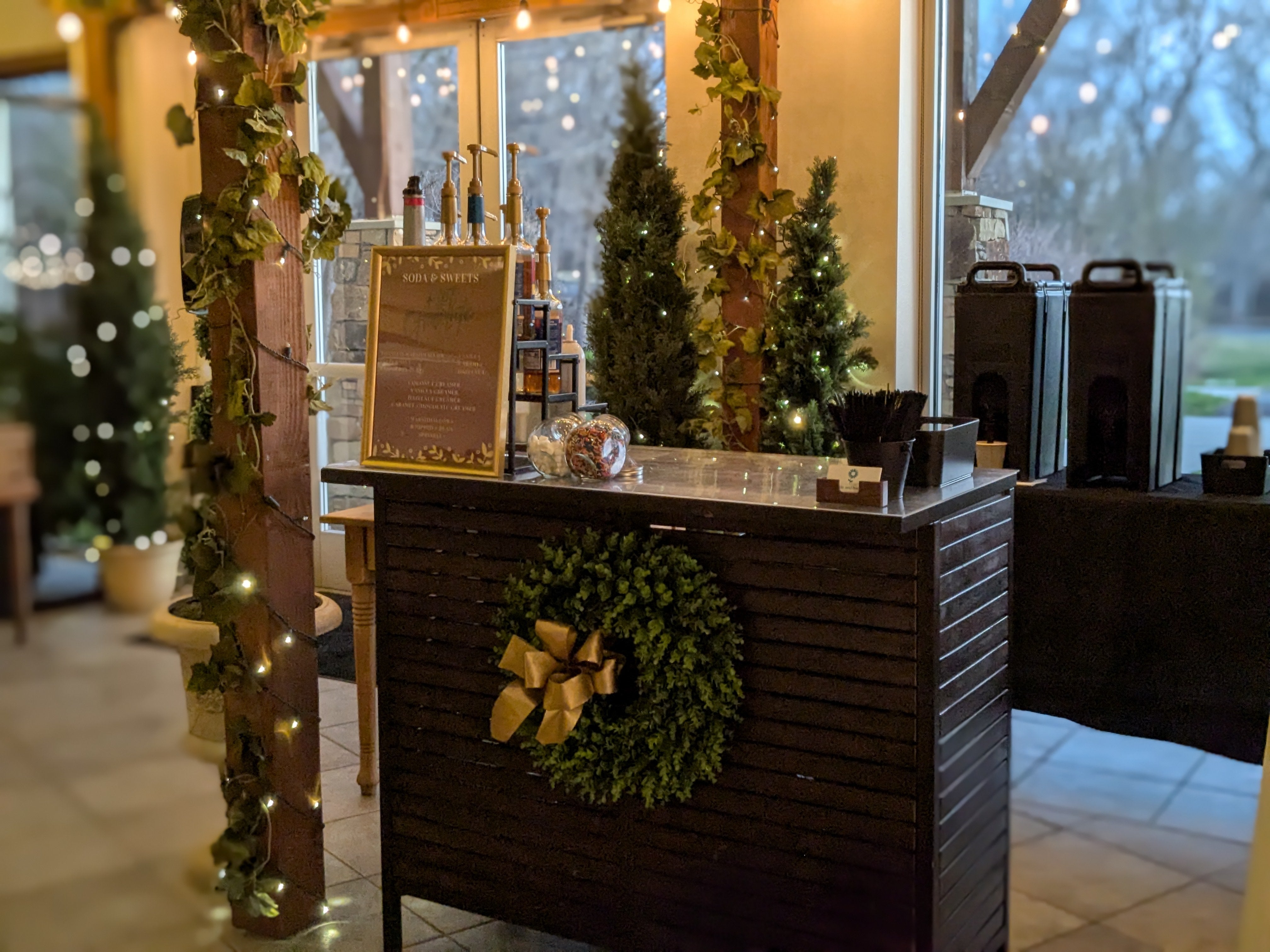 Large wooden serving bar serving customized hot chocolate flavors and selections.  