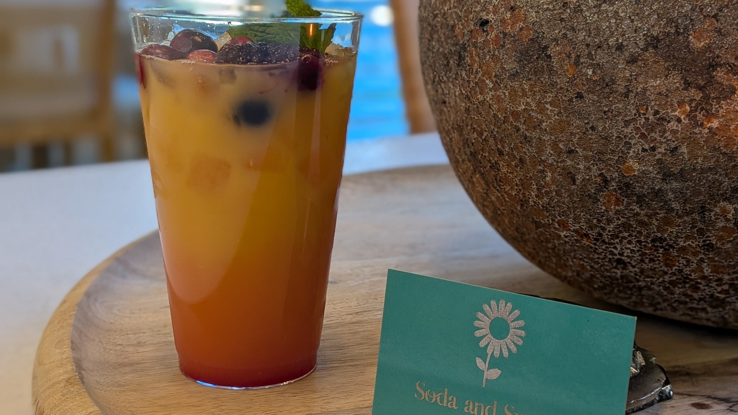 Non-alcoholic mocktail made with fresh juices and toppings.  