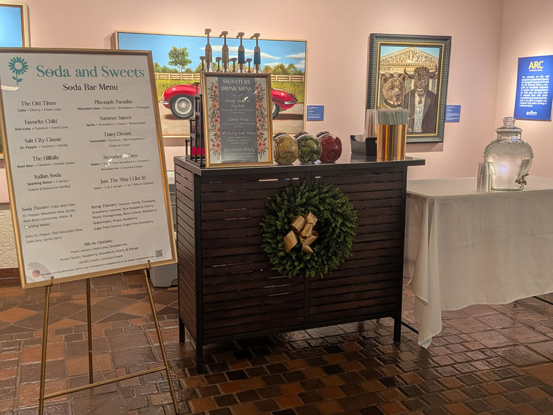 Soda ar in a festive indoor setting.  Large menu and syrups to mix into sodas.  